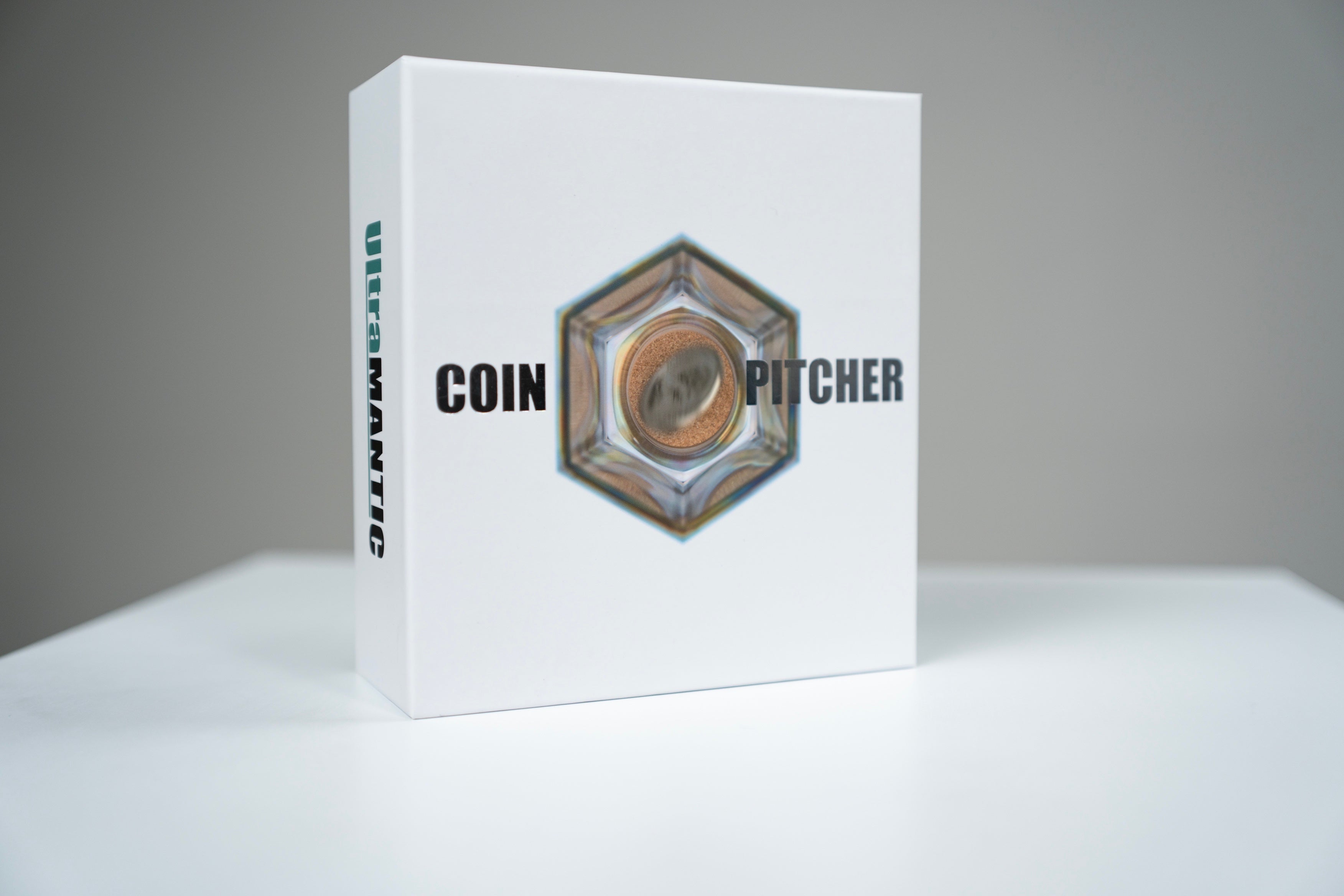 Coin Pitcher product box with the cork device displayed in front